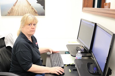 Bonnie Rumbel at her desk